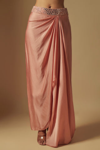 Waist-down view of rose gold satin drape skirt pleated at the side with a mirror waistband by Asaga at Mrs. G