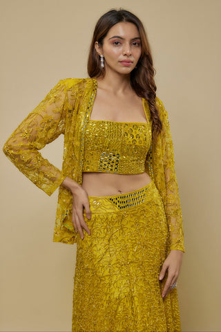 Waist-up view of the yellow square-neck mirror crop top and sheer floral jacket by Asaga at Mrs. G