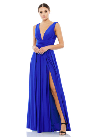 Full-length front view of the royal blue jersey gown with a plunge neckline and thigh-high slit by Mac Duggal at Mrs. G