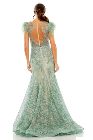 Back view of the sage trumpet gown showing the illusion open back and sweeping train by Mac Duggal at Mrs. G