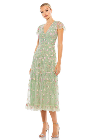 Full-length front view of the sage green floral midi dress with V-neck and cap sleeves by Mac Duggal at Mrs. G