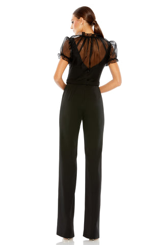 Back view of the black wide-leg jumpsuit showing the sheer illusion yoke and zipper by Mac Duggal at Mrs. G