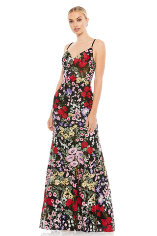 Front three-quarter view of the black multi embroidered gown with sweetheart neckline and slim straps by Mac Duggal at Mrs. G