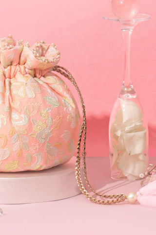 Peach flora round potli