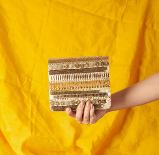 Gold inaayat clutch