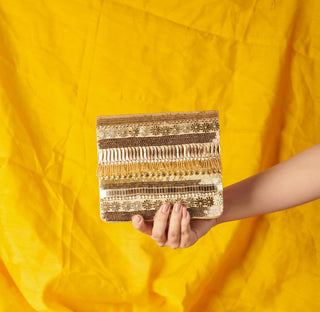 Gold inaayat clutch