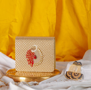 Gold mayuraa clutch