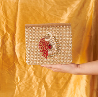 Gold mayuraa clutch