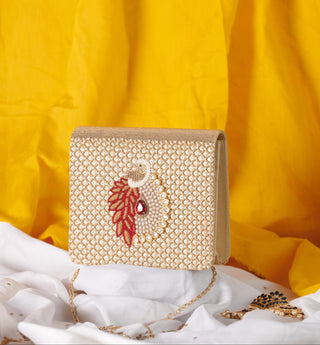 Gold mayuraa clutch