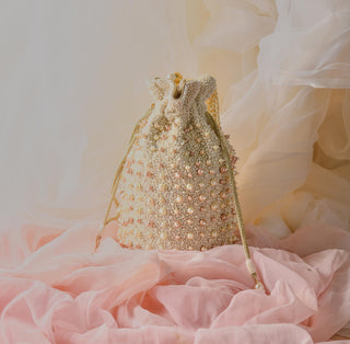 White sweet pearls potli