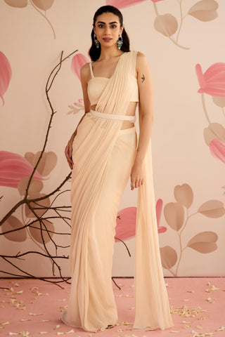 Full-length front view of the ivory pre-stitched saree with slim embellished belt by Seema Thukral at Mrs. G