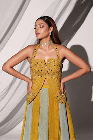 Waist-up view of the mirror work halter blouse with notched sweetheart neckline by Kiyohra at Mrs. G