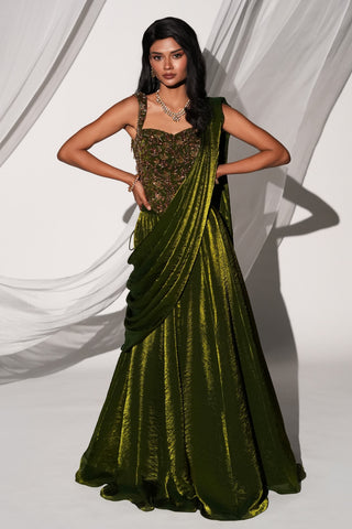 Full-length front view of the olive green pre-draped saree lehenga with sweetheart corset blouse by Kiyohra at Mrs. G