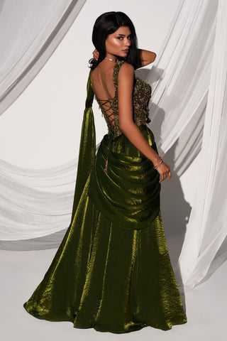 Back view of the lace-up corset blouse and gathered drape over the olive green skirt by Kiyohra at Mrs. G