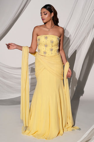 Full-length view of the sheer dupatta with beaded tassel ends beside the fishtail skirt by Kiyohra at Mrs. G