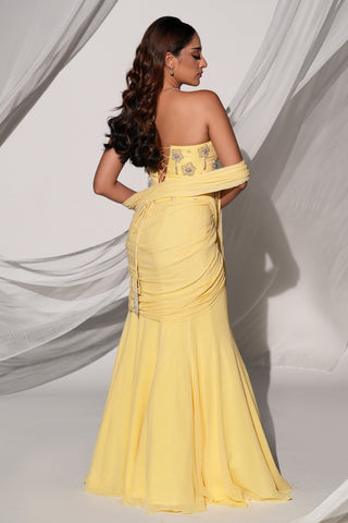 Back view of the lace-up strapless blouse and ruched drape over the fishtail skirt by Kiyohra at Mrs. G