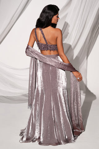 Back view of the one-shoulder strap, beaded fringe hem and dupatta over the metallic skirt by Kiyohra at Mrs. G