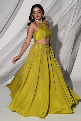 Twirl view of the green lehenga set showing the flared skirt and vertical sequin rows in motion by Kiyohra at Mrs. G