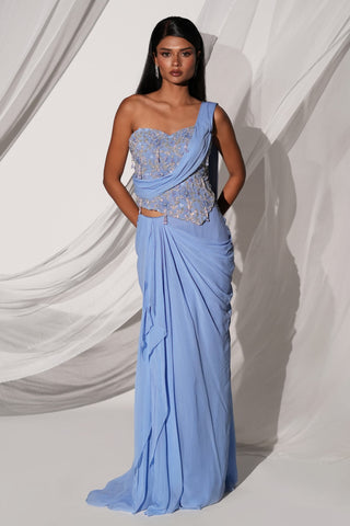 Full-length front view of the blue draped saree set with a beaded corset blouse and cascading skirt by Kiyohra at Mrs. G