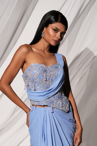 Waist-up view of the strapless sweetheart corset with silver and pale blue florals and tassels by Kiyohra at Mrs. G