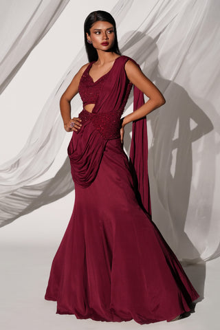 Three-quarter view of the maroon saree set showing the draped hip fold and flared fishtail skirt by Kiyohra at Mrs. G