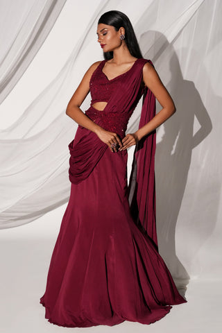 Side view of the maroon pre-draped saree set with the drape falling from the shoulder by Kiyohra at Mrs. G