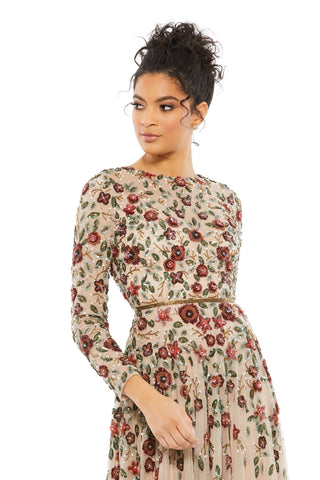 Waist-up view of the antique rose floral applique long sleeve illusion gown showing the high neckline, long sleeves and beaded waist by Mac Duggal at Mrs. G