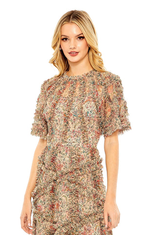 Waist-up view of the beige multi floral ruffle flutter sleeve tiered midi dress showing the ruffled neckline, flutter sleeves and wildflower print by Mac Duggal at Mrs. G