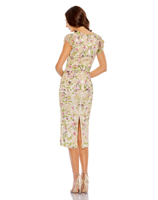 Back view of the cream multi floral midi dress showing the back slit and ruffled cap sleeves by Mac Duggal at Mrs. G