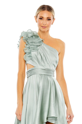 Waist-up view of the sage ruffle one shoulder cutout high-low gown showing the tiered shoulder ruffle and ruched waistband by Mac Duggal at Mrs. G