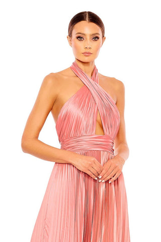 Waist-up view of the rose pink pleated halter handkerchief hem gown showing the crisscross halter neckline and ruched waistband by Mac Duggal at Mrs. G