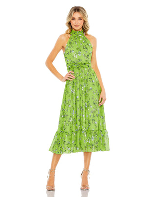 Full-length front view of the sage multi floral chiffon halter midi dress with a ruffled hem by Mac Duggal at Mrs. G