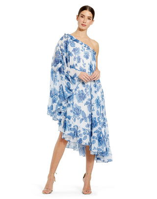 Full-length front view of the white multi rose print chiffon dress with one shoulder and a cape bell sleeve by Mac Duggal at Mrs. G