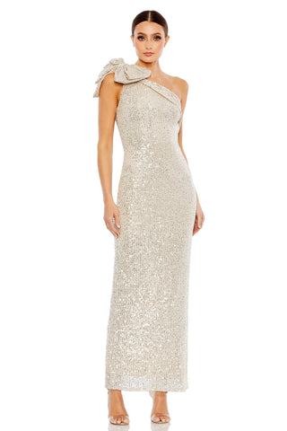 Full-length front view of the silver sequin column gown with a one shoulder bow by Mac Duggal at Mrs. G