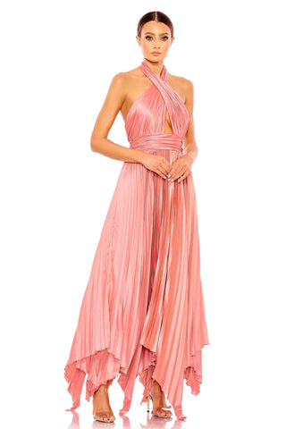 Three-quarter front view of the pink pleated halter gown with keyhole cutout by Mac Duggal at Mrs. G