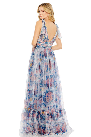 Back view of the blue floral gown showing the open V back and shoulder ties by Mac Duggal at Mrs. G