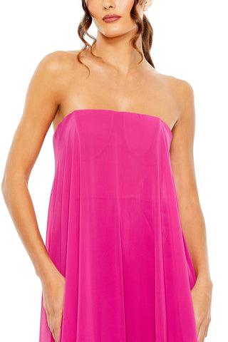 Zoomed-in close-up of the strapless neckline and seamed bodice of the pink chiffon gown by Mac Duggal at Mrs. G