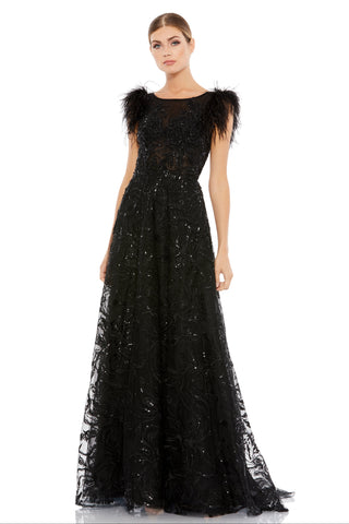 Full-length front view of the black A-line gown with feather cap sleeves and beaded bodice by Mac Duggal at Mrs. G