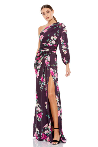 Full-length front view of the plum floral one-sleeve gown with a thigh-high slit by Mac Duggal at Mrs. G