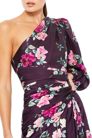 Zoomed-in close-up of the one-shoulder neckline, gathered balloon sleeve and ruched waist by Mac Duggal at Mrs. G
