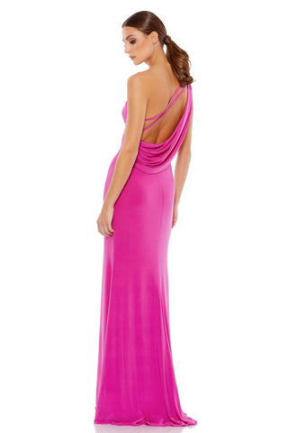 Back view of the candy pink jersey gown showing the cowl drape, open back and two slim straps by Mac Duggal at Mrs. G