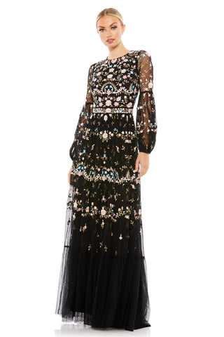 Full-length front view of the black embroidered gown with blouson sleeves and tiered tulle skirt by Mac Duggal at Mrs. G