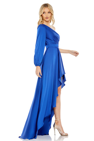 Side view of the blue satin gown showing the single blouson sleeve and floor-length train by Mac Duggal at Mrs. G