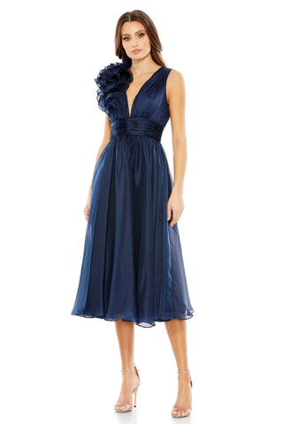 Full-length front view of the midnight chiffon tea length dress with a pleated cummerbund by Mac Duggal at Mrs. G