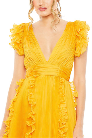 Zoomed-in close-up of the ruffled cap sleeves, deep V-neck and vertical skirt ruffles by Mac Duggal at Mrs. G