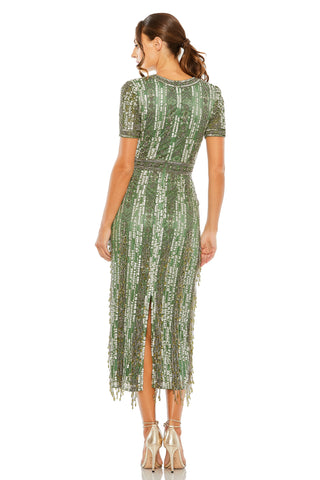 Back view of the sage beaded midi dress showing the back slit and beaded fringe hem by Mac Duggal at Mrs. G