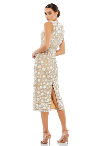 Back view of the beige floral applique midi dress showing the back slit and high neckline by Mac Duggal at Mrs. G