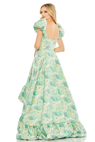 Back view of the spring green brocade dress showing the square scoop back and ruffled hem by Mac Duggal at Mrs. G