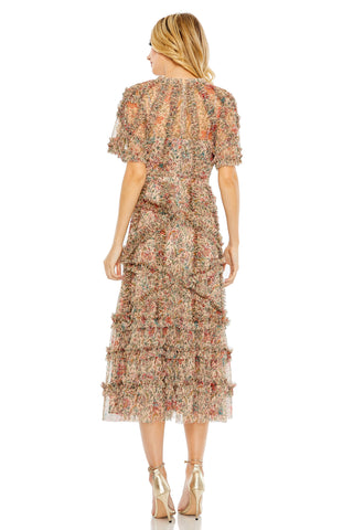 Back view of the beige floral midi dress showing the crisscross ruffles and tiered hem by Mac Duggal at Mrs. G