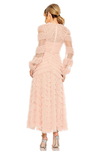 Back view of the pink tiered ruffle maxi dress showing the center back zip and sheer sleeves by Mac Duggal at Mrs. G